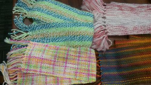 Four woven scarves 